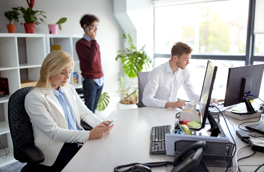 business-team-with-smartphones-at-office-2024-09-28-03-21-06-utc